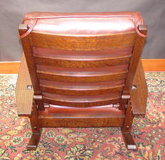 Curved steam-bent back slats and hand-turned adjusting pegs, accurate replication of Gustav Stickley mid-period adjusting peg system and chair back hand-turned "axle and spacer".